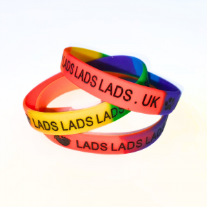 Rainbow wristband with LADS LADS LADS . UK on it